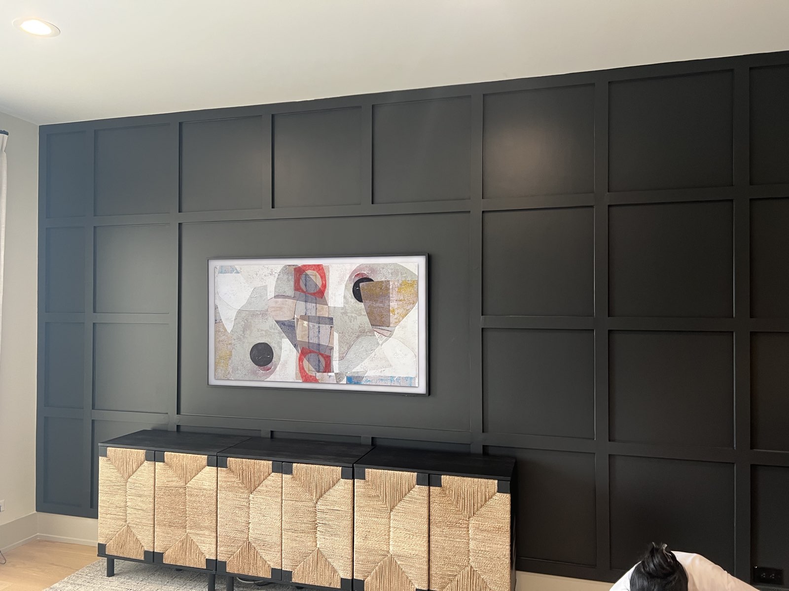 Grid panel moulding accent wall painted black